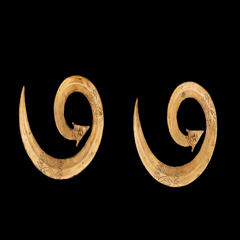 A pair of 19th-century gilded bronze sangorri ornaments from Central Sulawesi Indonesia