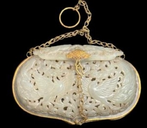 A Pierced Jade Pomander mounted in silver-gilt Liao Dynasty 11th Century Liao Dynasty 11th century pierced jade pomander mounted in silver-gilt with phoenixes