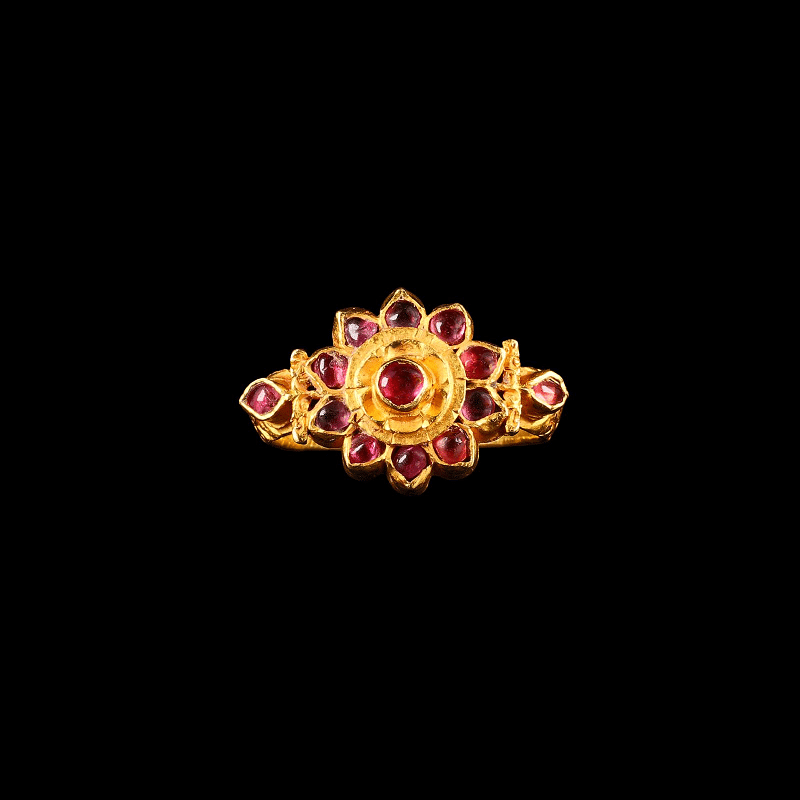 A 19th-century South Indian ruby and gold ring in lotus flower form